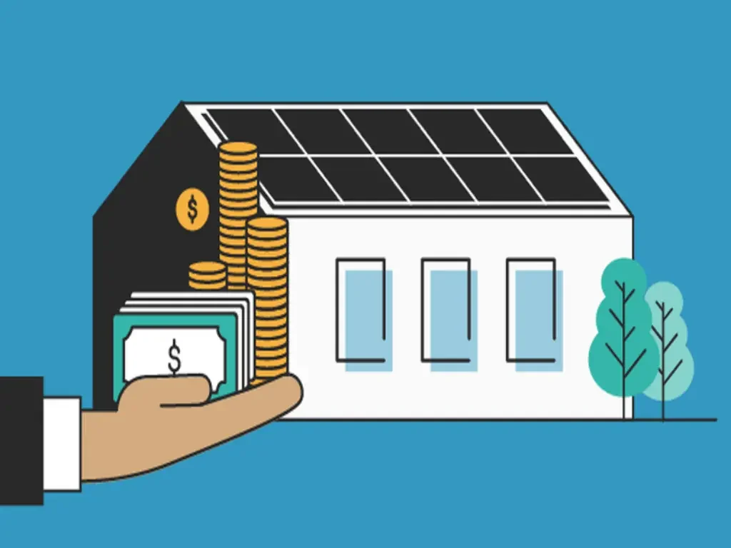 A hand holding a stack of coins next to a house with solar panels.