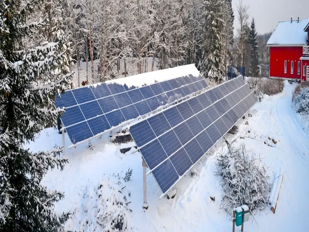 view of solar panels under the snow