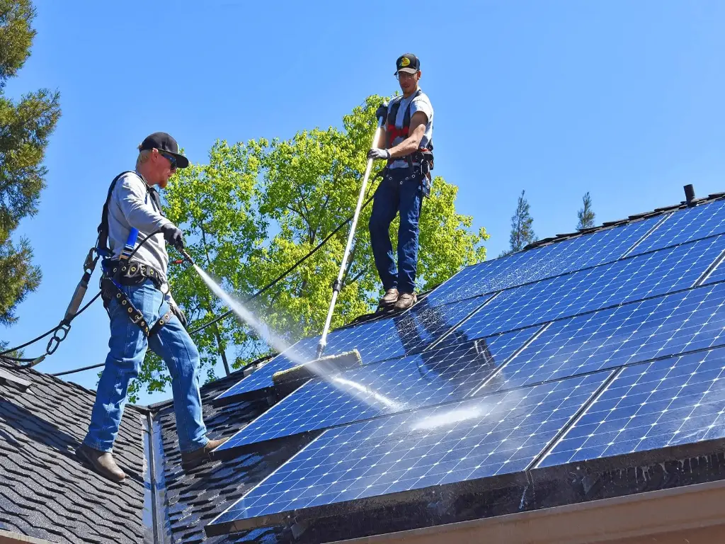 washing solar panels using water