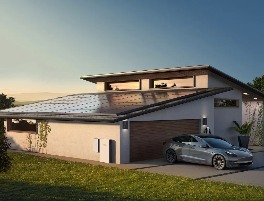  A house with an electric car and Tesla Powerwall